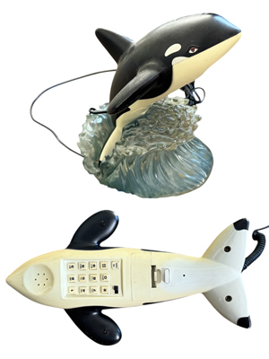 Leaping Dolphin in Glass Wave Base Telephone Props, Prop Hire